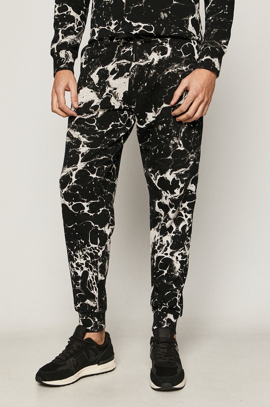 Spodnie męskie dresowe w marmurkowy wzór czarne wzorzyste czarny RW20.SPMA30