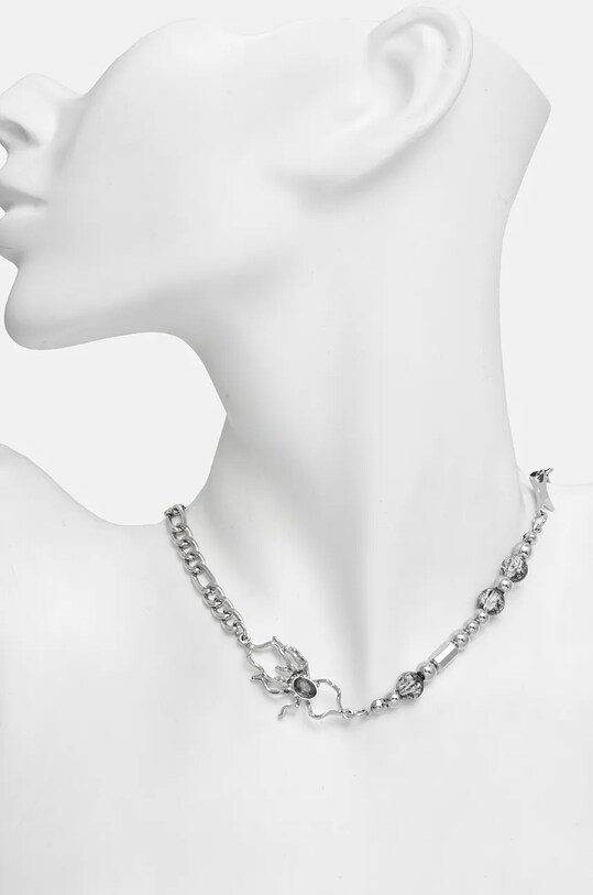 Akcesoria Naszyjnik damski z ozdobnymi elementami kolor srebrny RW24.AKD711 srebrny