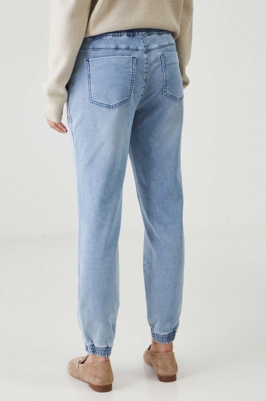 Odzież Jeansy damskie jogger z efektem sprania kolor niebieski RW24.SJD301 niebieski