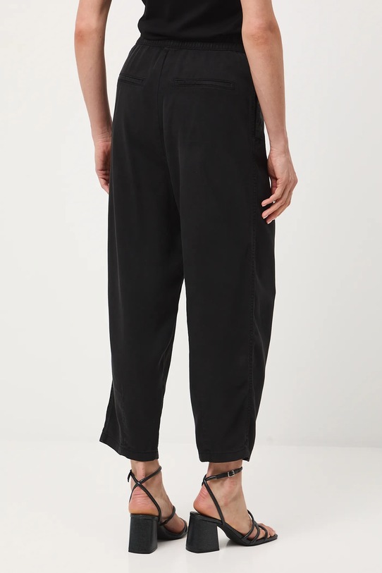 Odzież Spodnie damskie slouchy z lyocellu RW25-SPD400 czarny