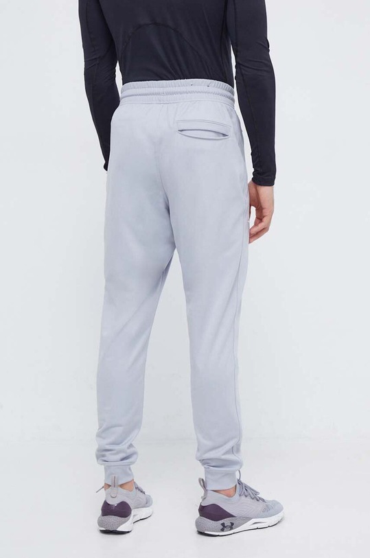 Odzież Under Armour spodnie dresowe 1290261 szary