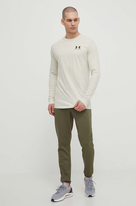 Under Armour spodnie dresowe 1290261 zielony SS24