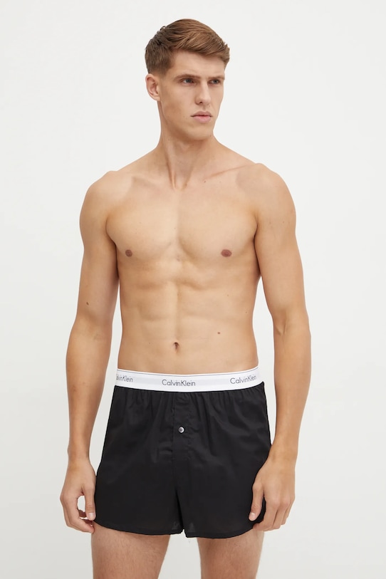 Boxerky Calvin Klein Underwear hladký černá 000NB1396A