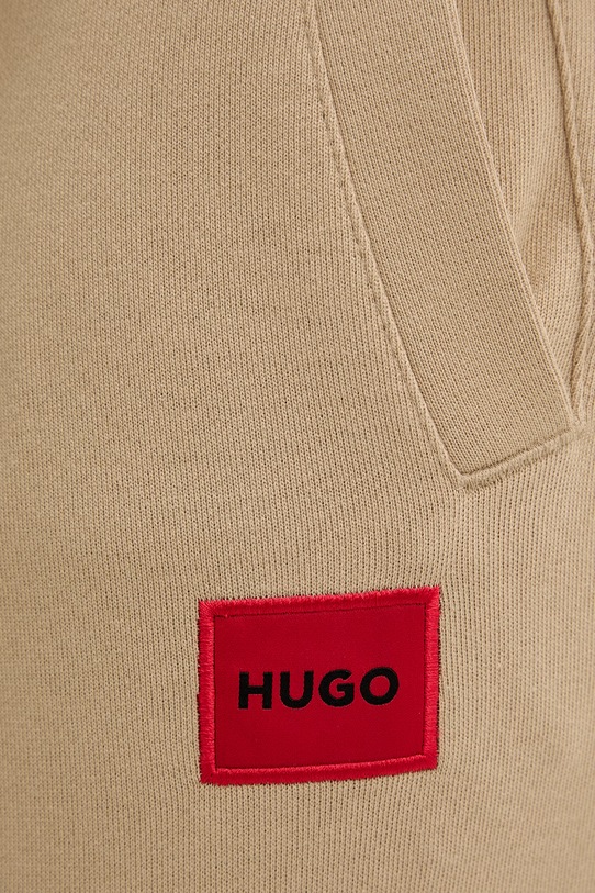 HUGO spodnie dresowe bawełniane Doak212 beżowy 50447963