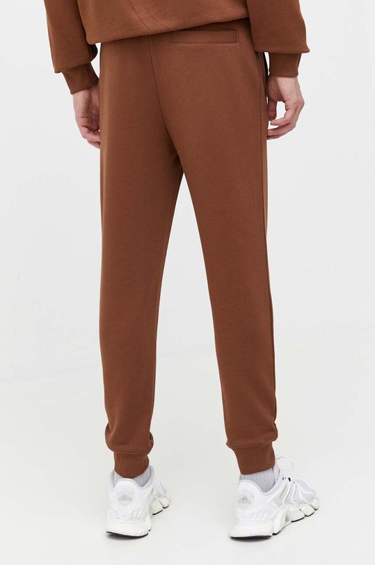 Одяг Бавовняні спортивні штани HUGO Doak212 50447963 коричневий