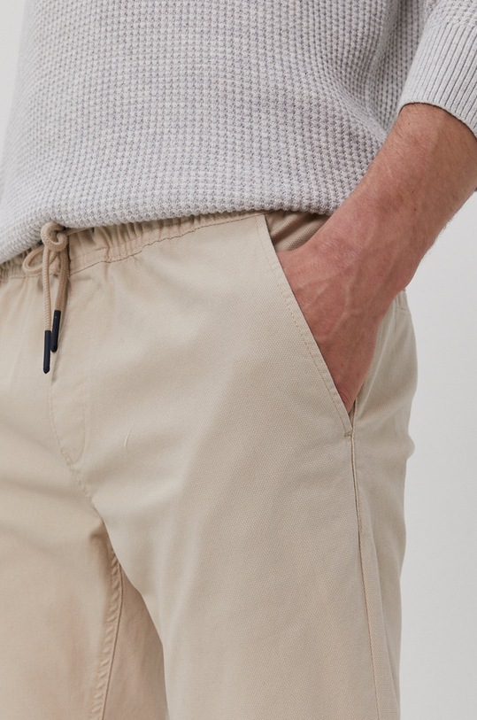 Tommy Jeans Spodnie DM0DM10125.4891 beżowy DM0DM10125.4891