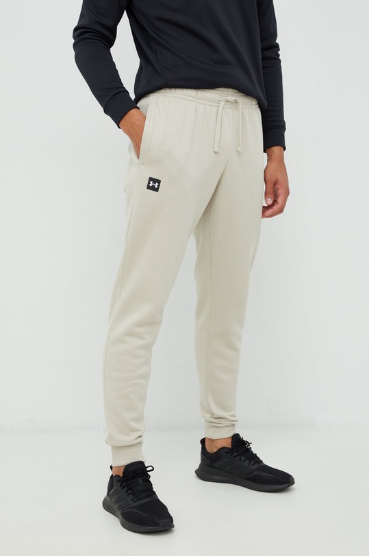 Under Armour spodnie dzianina beżowy 1357128