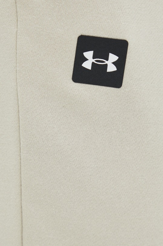 Odzież Under Armour spodnie 1357128 beżowy