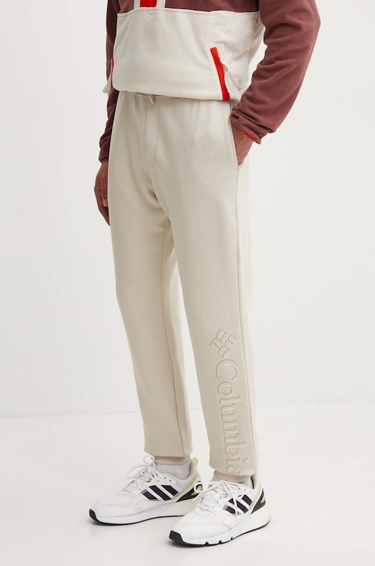 Columbia spodnie dresowe CSC Logo dzianina beżowy 1911601