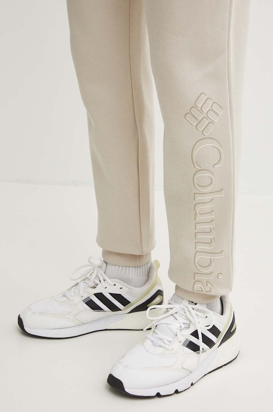 Columbia spodnie dresowe CSC Logo beżowy 1911601