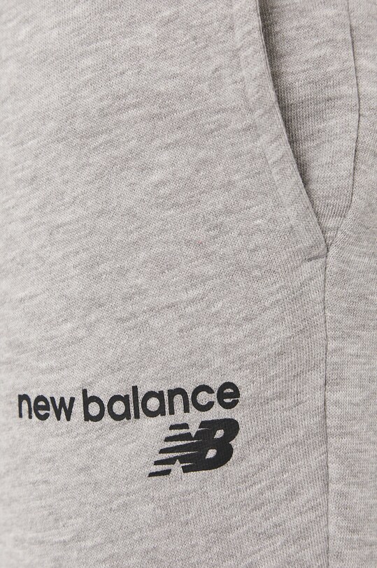 Nohavice New Balance MP03904AG sivá MP03904AG