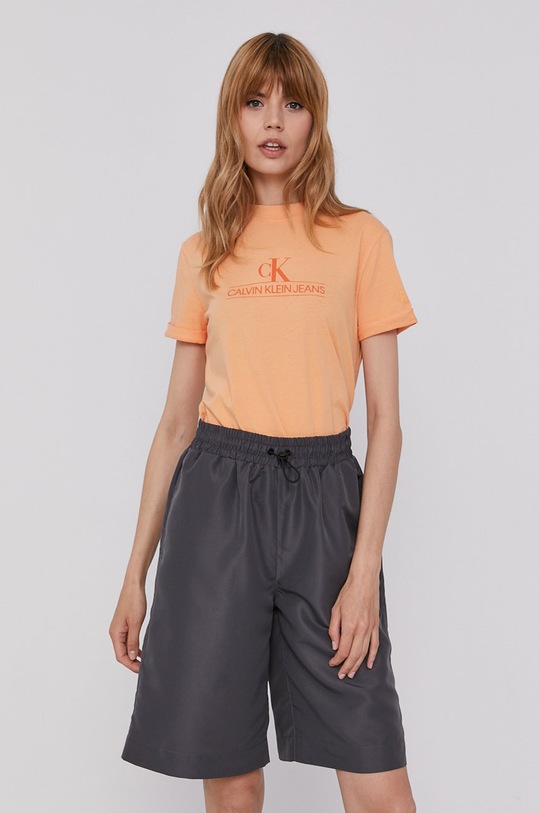 Tričko Calvin Klein Jeans bavlna oranžová J20J215614.4891
