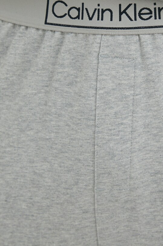 Pyžamové kalhoty Calvin Klein Underwear šedá 000NM2272E.PPYY