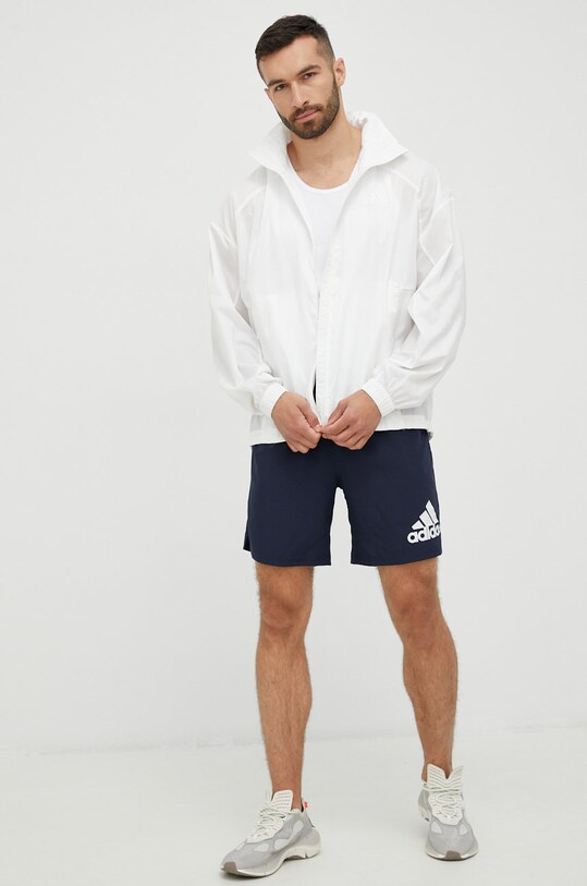 Větrovka adidas Performance Traveer H48579 bílá AW22