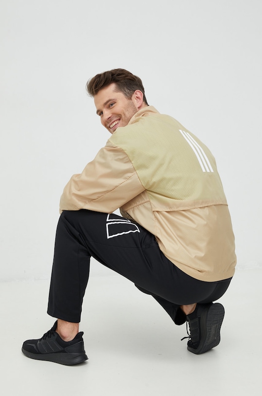 Větrovka adidas Performance nezateplené béžová H65735