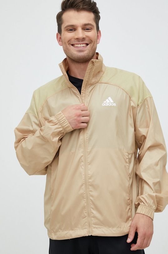 Větrovka adidas Performance H65735 béžová AW22