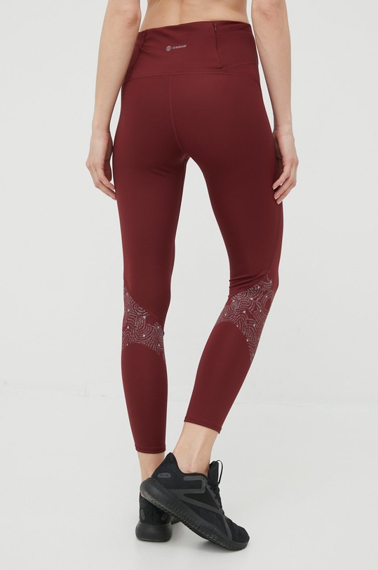 Odzież adidas Performance legginsy do biegania Own The Run HB9238 HB9238 bordowy