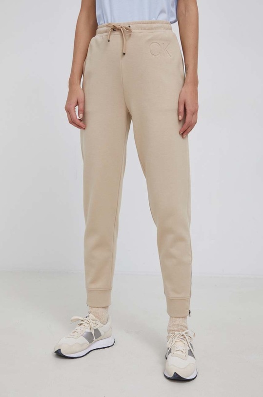 Nohavice Calvin Klein K20K203492.PPYY béžová SS22