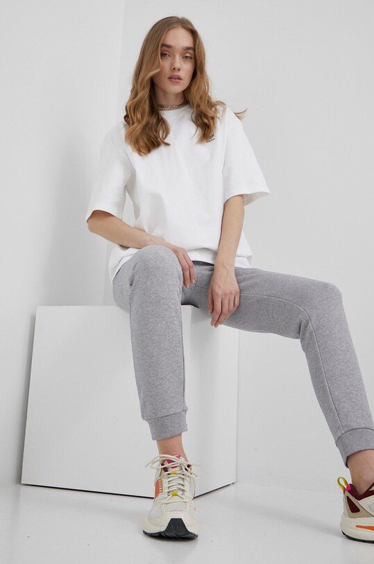 Nohavice adidas Originals s elastanom sivá HF7501