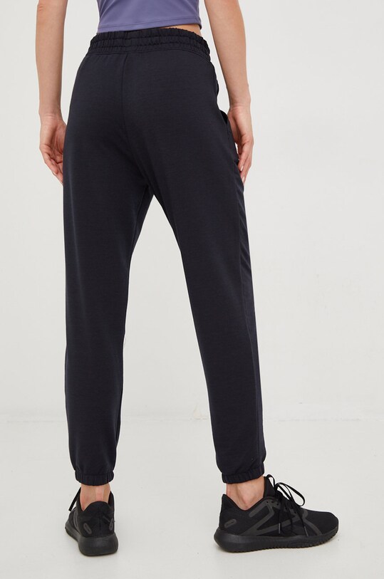 Odzież Under Armour spodnie dresowe 1369854 czarny