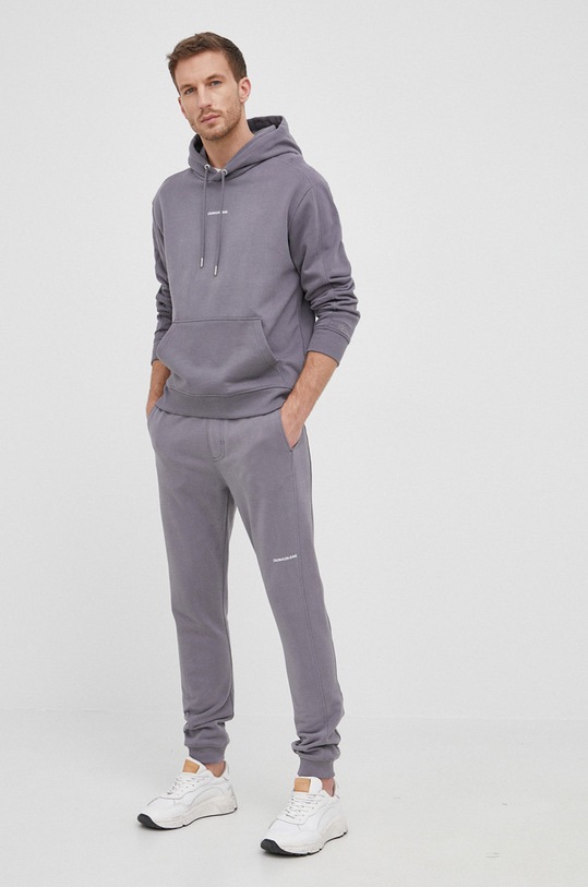 Bavlnené nohavice Calvin Klein Jeans J30J319649.PPYY sivá SS22