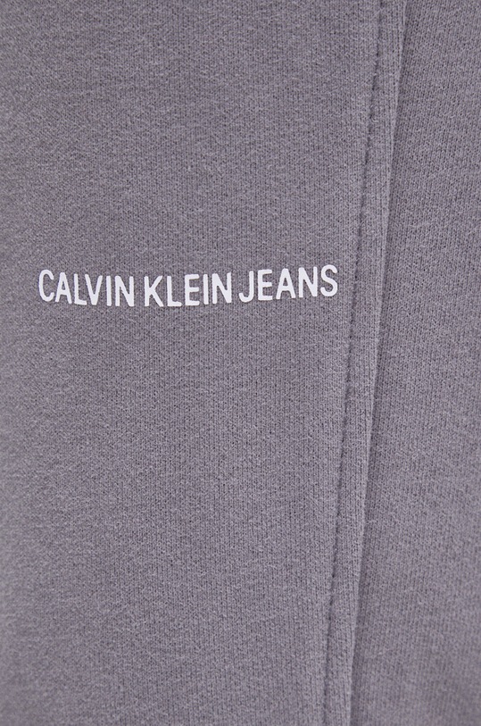 Bavlnené nohavice Calvin Klein Jeans J30J319649.PPYY sivá