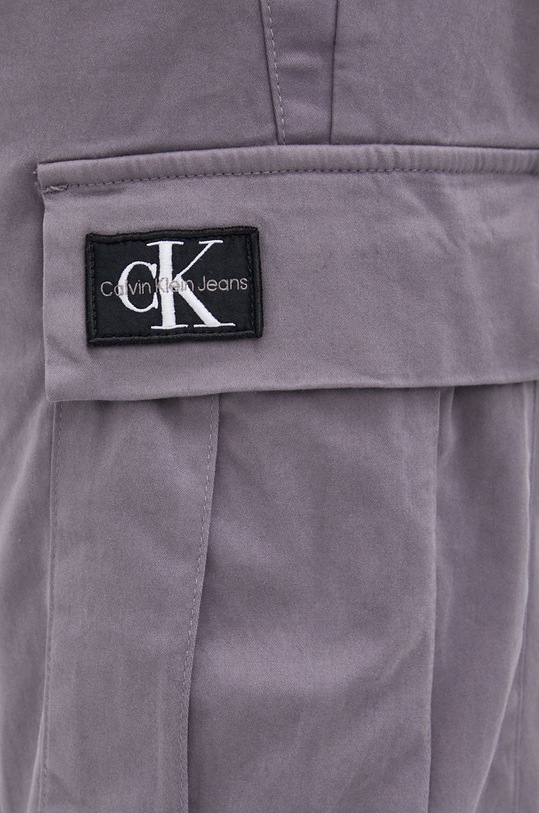 Nohavice Calvin Klein Jeans fialová J30J319650.PPYY
