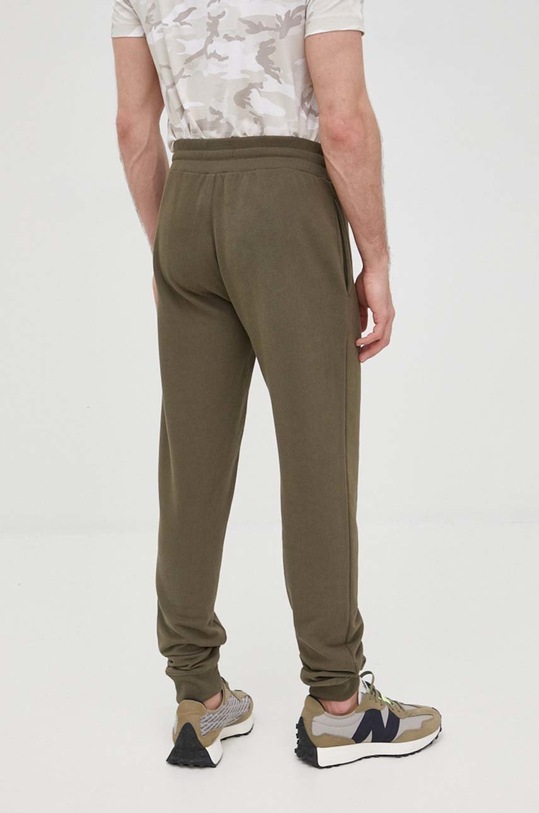 Odzież Tommy Hilfiger spodnie dresowe UM0UM02566.PPYY zielony