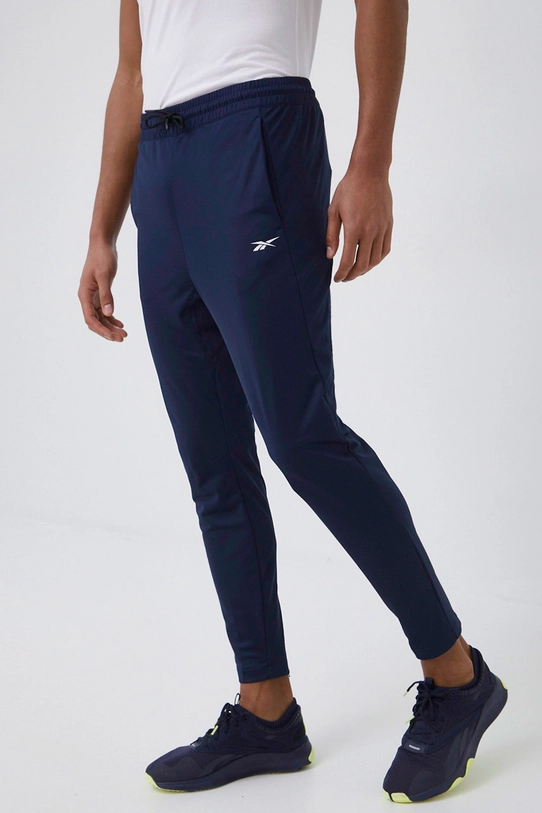 Reebok pantaloni de trening tricotaj bleumarin GJ0840