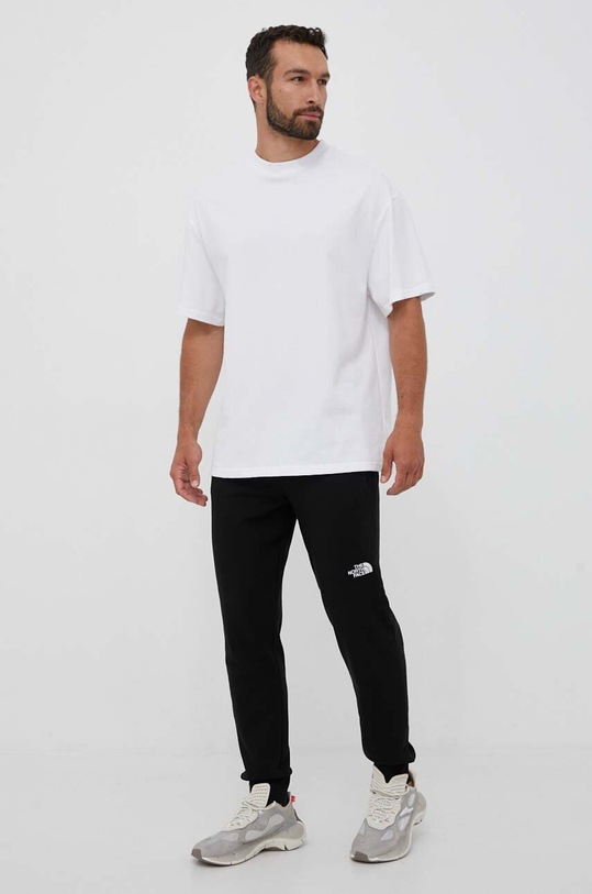 The North Face spodnie bawełniane NF0A4T1FJK31 czarny SS24