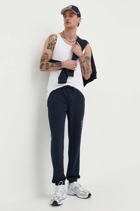 Rip Curl spodnie dresowe CPACL9 granatowy SS23