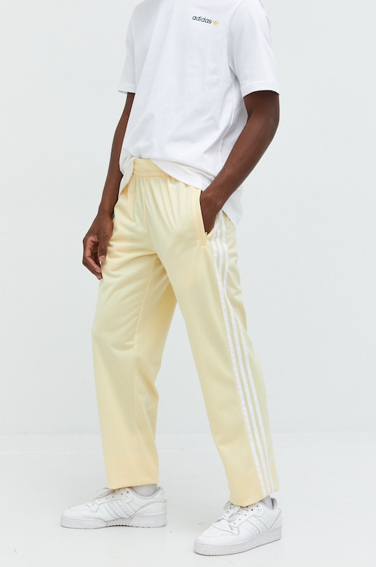adidas Originals spodnie dresowe HR7900 żółty SS22