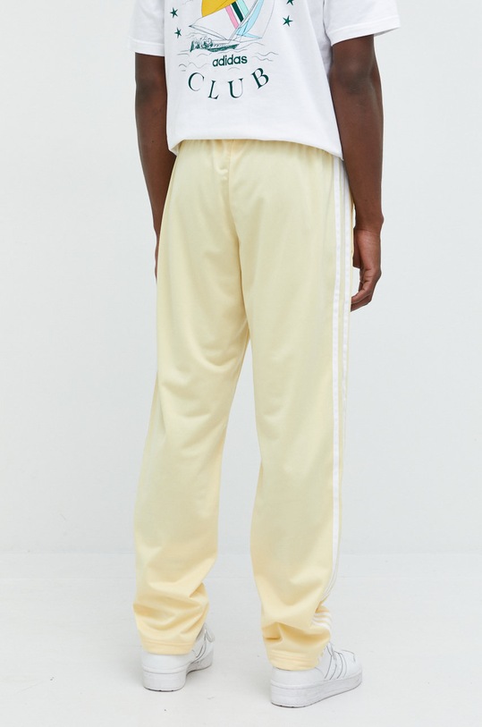 Odzież adidas Originals spodnie dresowe HR7900 żółty