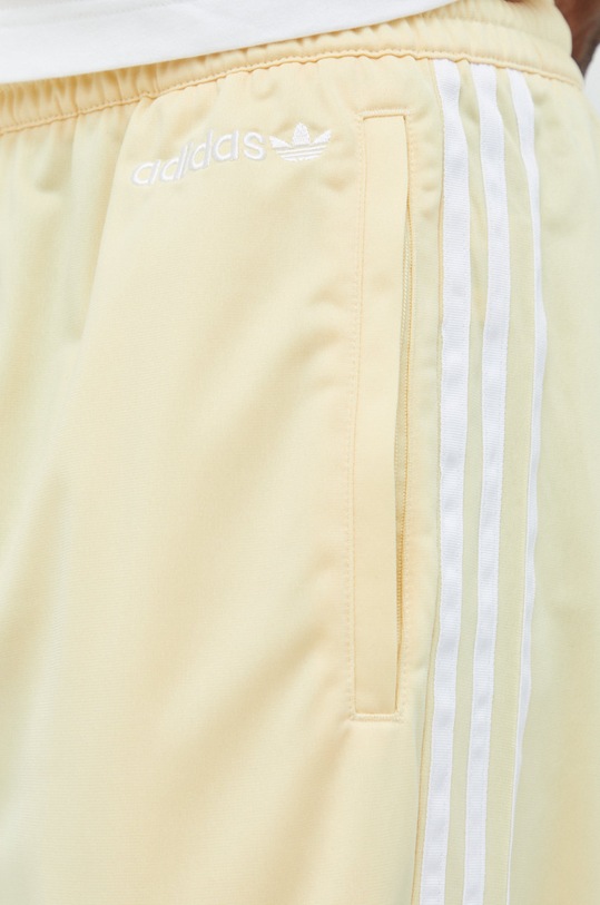adidas Originals spodnie dresowe żółty HR7900