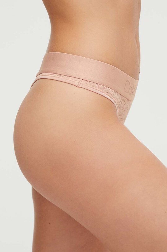 Calvin Klein Underwear stringi 000QF7287E.PPYX beżowy AW23