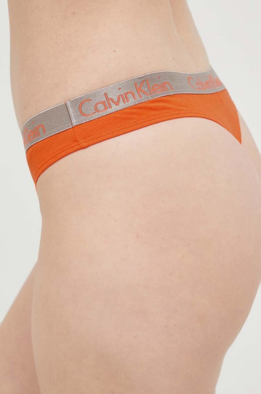 Calvin Klein Underwear stringi 000QD3539E.PPYX pomarańczowy SS23
