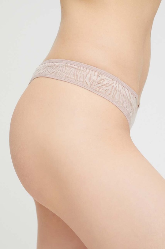 Calvin Klein Underwear stringi 000QF6878E.PPYX beżowy AW23