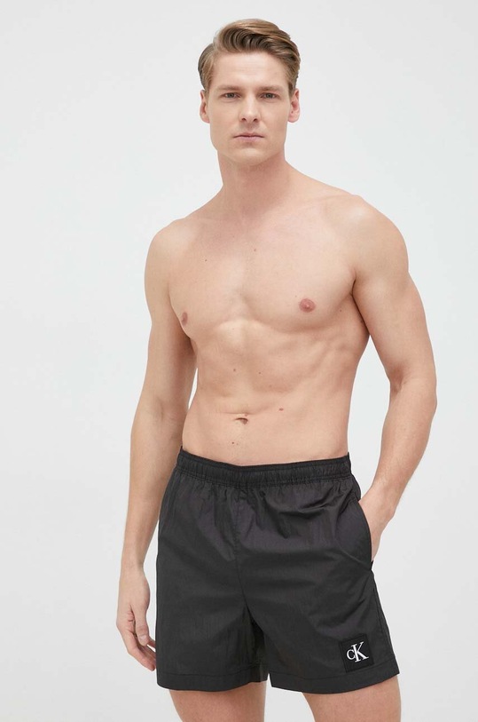 Plavkové šortky Calvin Klein černá KM0KM00819.PPYX