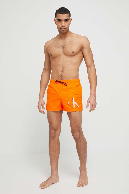 Calvin Klein szorty kąpielowe KM0KM00801.PPYX pomarańczowy SS23