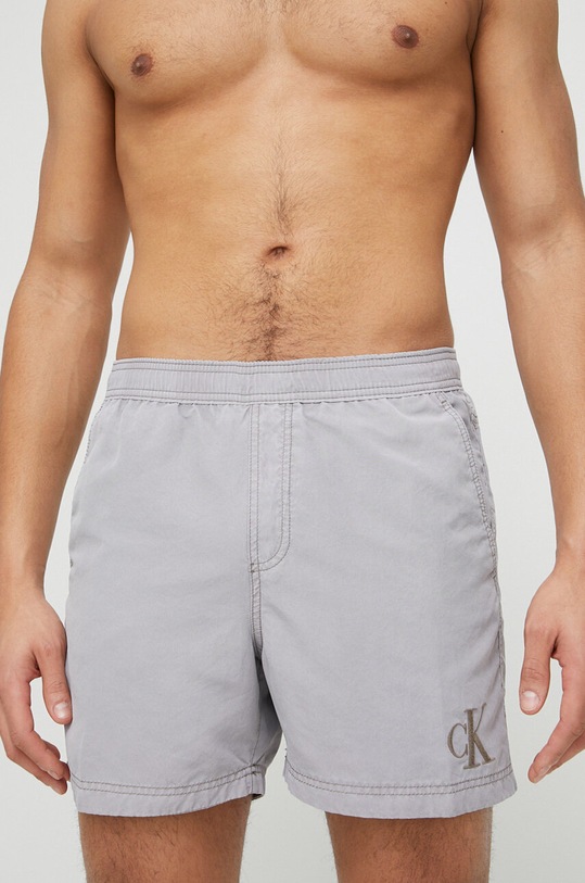 Plavkové šortky Calvin Klein šedá KM0KM00806.PPYX