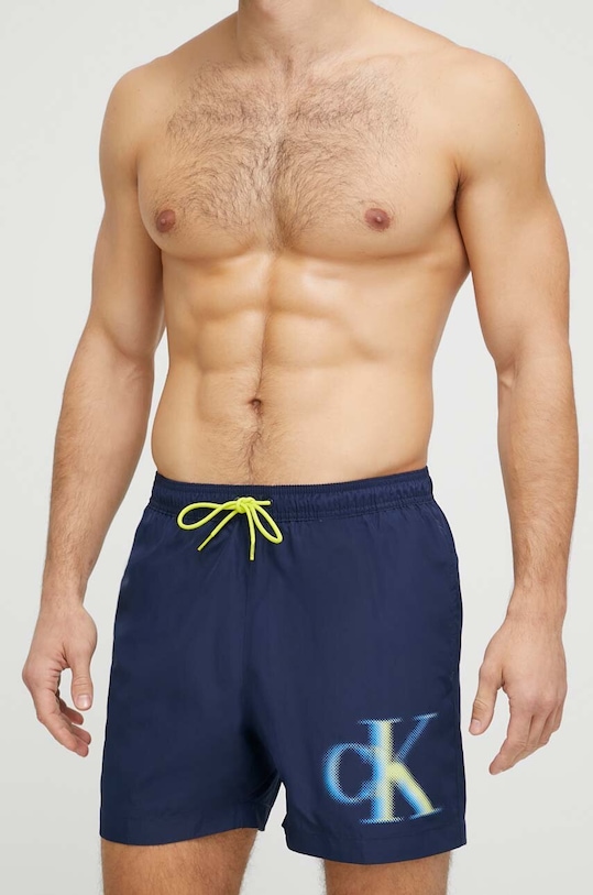 Plavkové šortky Calvin Klein potisk námořnická modř KM0KM00800.PPYX