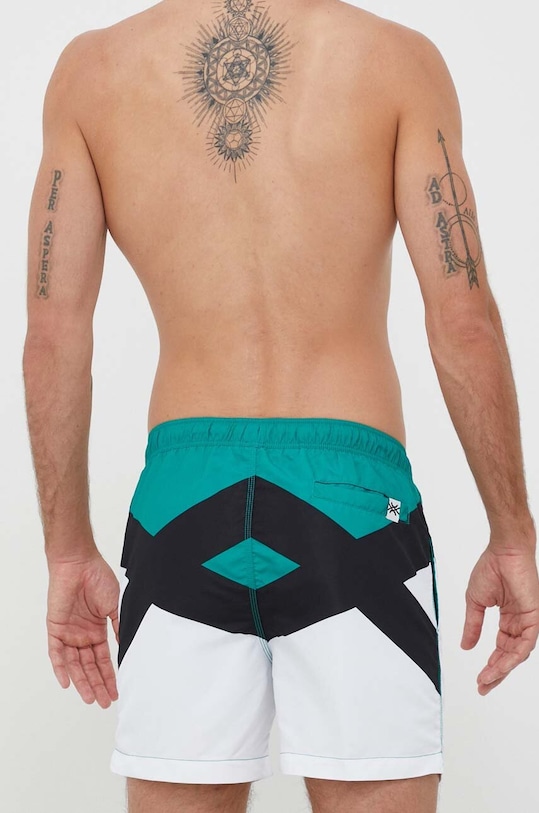 Oblačila Kopalne kratke hlače United Colors of Benetton 5JD06X00E.901 zelena