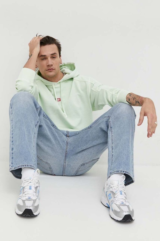 Bavlněná mikina Tommy Jeans DM0DM16381.PPYX zelená SS23