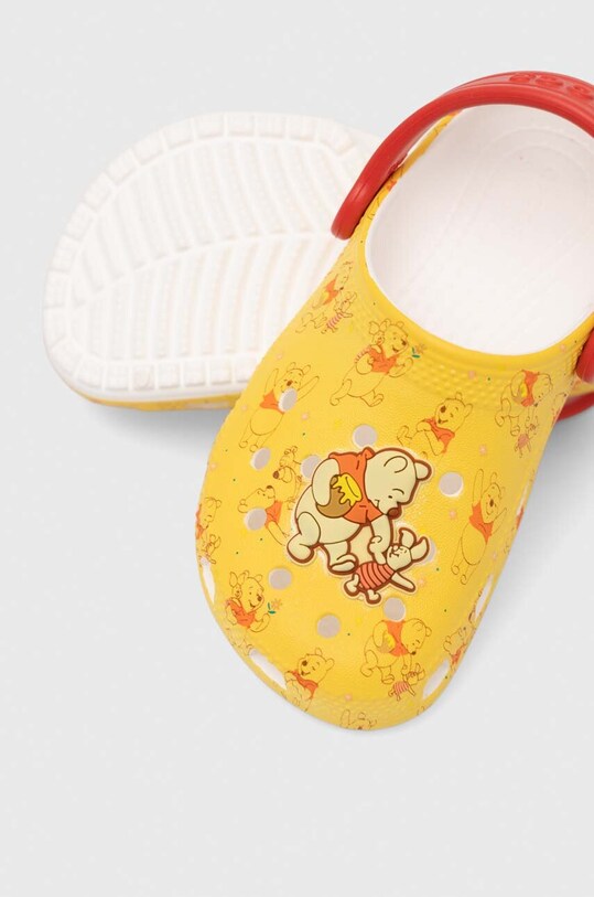 Παιδικές παντόφλες Crocs κίτρινο 208358.CROCS.CLASSIC.DI