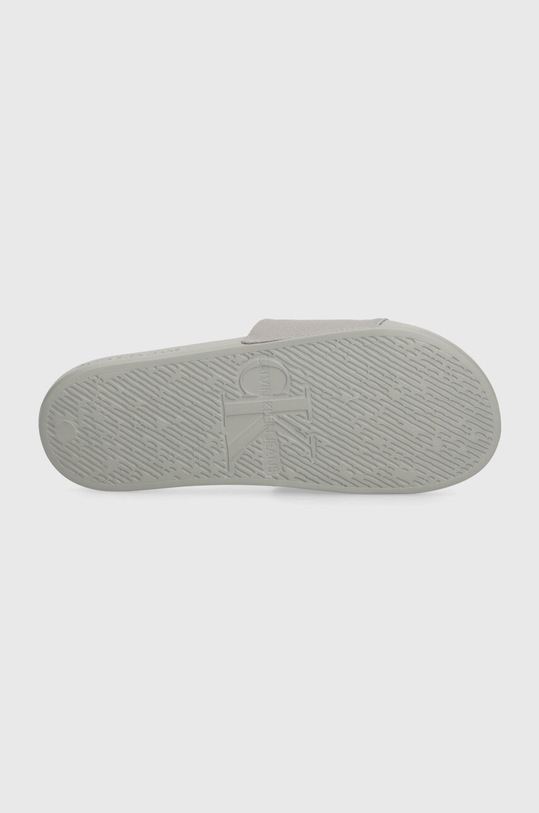 Šľapky Calvin Klein Jeans SLIDE MONOGRAM CO YM0YM00061 sivá