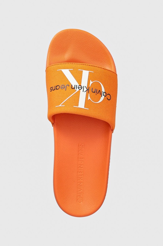 Calvin Klein Jeans klapki SLIDE MONOGRAM CO pomarańczowy YM0YM00061