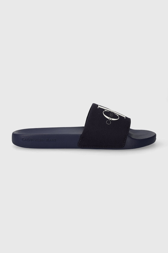 Natikači Calvin Klein Jeans SLIDE MONOGRAM CO mornarsko modra YM0YM00061