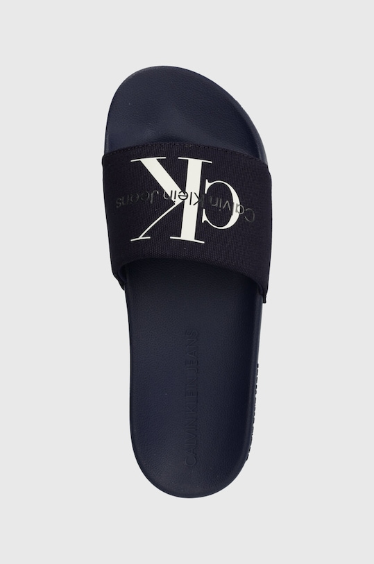Natikači Calvin Klein Jeans SLIDE MONOGRAM CO mornarsko modra YM0YM00061