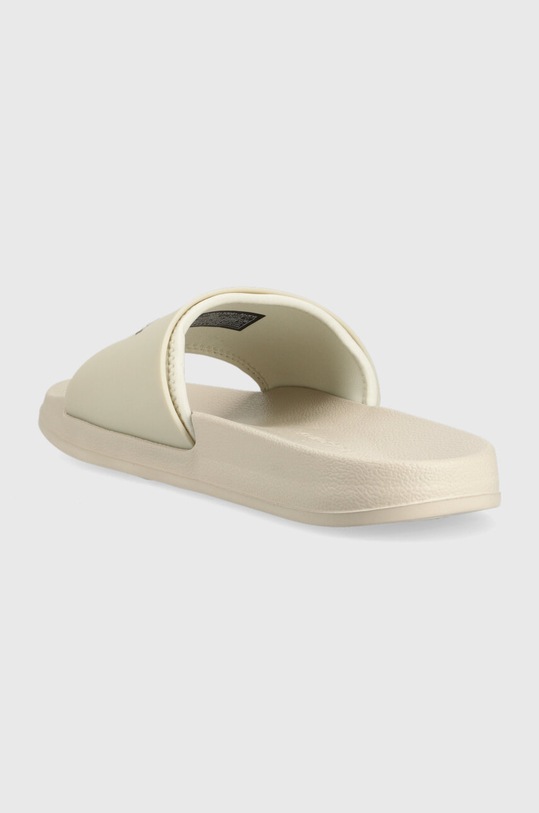 Obuwie Calvin Klein Jeans klapki SLIDE MONOGRAM TPU YM0YM00361 beżowy