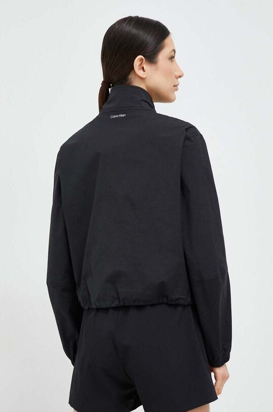 Odzież Calvin Klein Performance wiatrówka CK Athletic 00GWS3O502 czarny